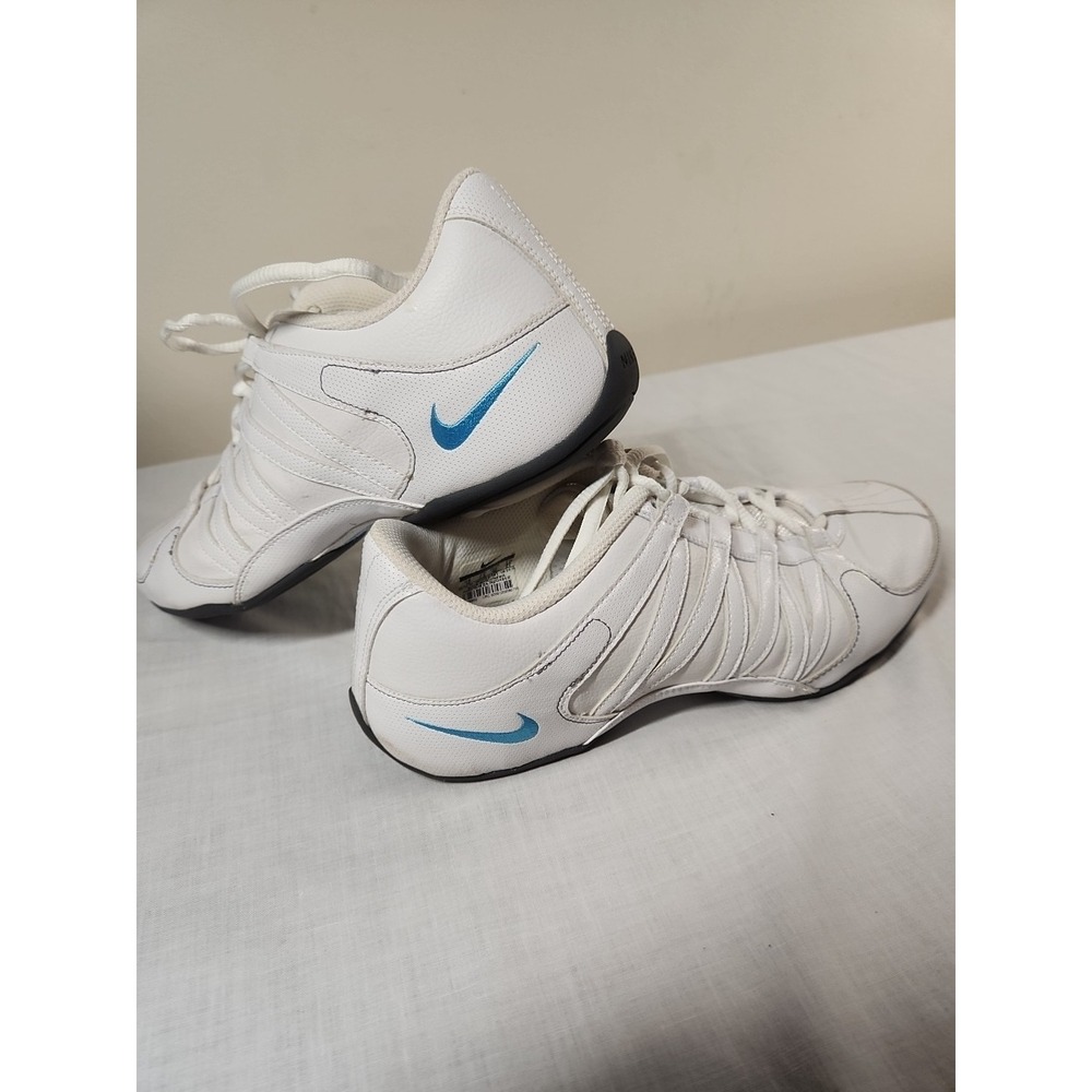 Nike White Athletic Shoes with Blue Swoosh